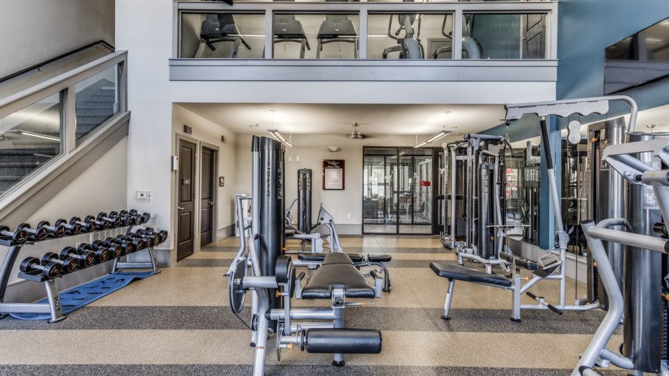 a gym with a large number of equipment at The Carson @ Twin Creeks